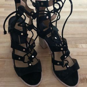 Strapped black heels. Worn a few times.